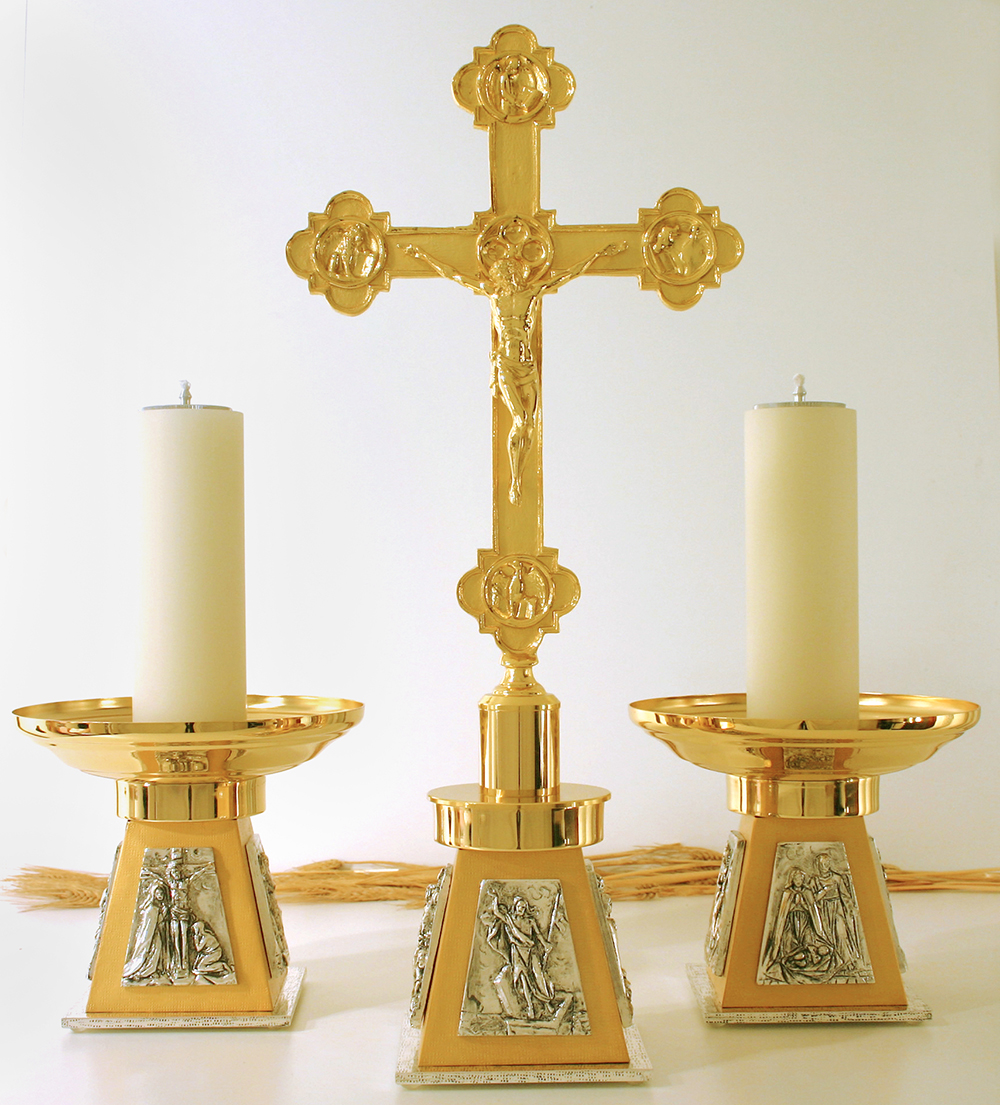 Candlesticks art. Er 310- Cross art. Er 3310. Made of metal with plaques depicting the life of Jesus